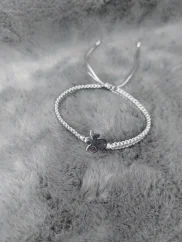 Pletený náramek s andělem z chirurgické oceli